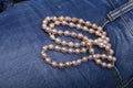 Jeans and Pearl Necklace Royalty Free Stock Photo