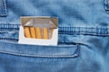 Jeans pocket with a packet of cigarettes Royalty Free Stock Photo