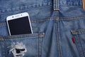 Jeans pocket with smartphone Royalty Free Stock Photo