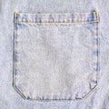 Jeans pocket texture closeup. light blue denim background. square frame Royalty Free Stock Photo