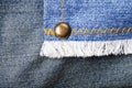 Jeans rivet seam closeup