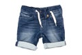 Jeans shorts isolated. Trendy stylish short jeans pants with white ribbon for child boy isolated on a white background. Royalty Free Stock Photo