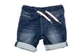 Jeans shorts isolated. Trendy stylish short jeans pants with white ribbon for child boy isolated on a white background. Royalty Free Stock Photo