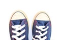 Jeans sneakers on white Royalty Free Stock Photo