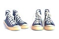 Jeans sneakers on white Royalty Free Stock Photo