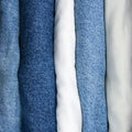 Jeans stack, detailed vertical macro closeup, blue indigo denim, khaki, white beige