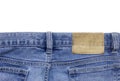 Jeans texture with leather label isolated white background Royalty Free Stock Photo