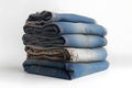 Jeans trousers stack on white background. Neural network AI generated Royalty Free Stock Photo