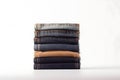 Jeans trousers stack on white background. Neural network AI generated Royalty Free Stock Photo