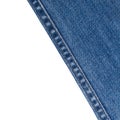 Jeans on white background with copy spcae. Royalty Free Stock Photo