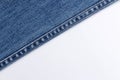 Jeans on white background with copy spcae. Royalty Free Stock Photo
