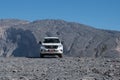 Jebel Shams / Oman - 12 Janury 2020: Toyota Prado offroad car on the top of Jebel Shams mountains Royalty Free Stock Photo