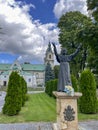 JEDRZEJOW, POLAND - September 1, 2023: Statue of Saint Pope John Paul II in front of the Cistercian Archabbey in Jedrzejow, Poland
