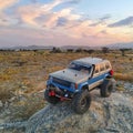 Jeep Cherokee RC Crawler car on a rock