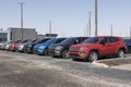 Jeep Compass display at a dealership. Jeep offers the Compass in Sport, Latitude, Limited and Trailhawk models