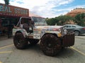 Jeep covered with license plates and made of metal tools