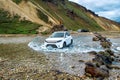 Jeep crossing a river