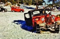 A Jeep has to be towed on a Colorado while on a December 1959 winter camping trip .