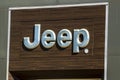 Jeep logo at a dealership. The subsidiaries of FCA are Chrysler, Dodge, Jeep, and Ram