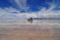 Jeep reflected in Salar de Uyuni