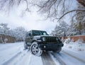 Jeep on the snowy street in Santa Fe, United States