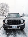 Jeep suv in a blizzard