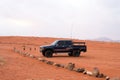 Jeep in Wadi Rum desert, Jordan Royalty Free Stock Photo