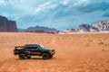 Jeep in Wadi Rum desert, Jordan Royalty Free Stock Photo
