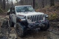 Jeep wrangler off-road driving in mud. Royalty Free Stock Photo