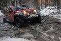 Jeep Wrangler in the winter forest, Russia Royalty Free Stock Photo