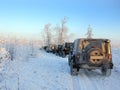 Jeep Wrangler in the winter forest, Russia Royalty Free Stock Photo