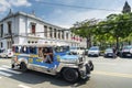 jeepney bus local transport traffic in downtown manila city street philippines