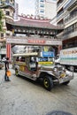 Jeepney and busy street traffic in central manila chinatown phil