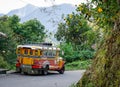 Jeepney car parking on the rural road in Ifugao, Philippines