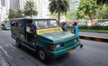 A jeepney running on Ayala street in Manila, Philippines Royalty Free Stock Photo