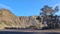 Jeeps line up parked on the sand field of mount Bromo, East Java, Indonesia Royalty Free Stock Photo