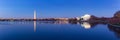 Jeffeerson Memorial and Washington Monument reflected on Tidal Basin.