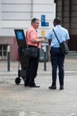 Jehovah witnesses standing in the street