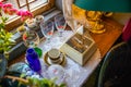 Jeju Island,South Korea-March 2019: Vintage retro antique glasses, tea cup, clock, and lamp on the table