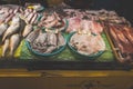 Fresh sea food and fishes selling at one of the stalls at Jeju Dongmun market