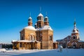 Jekabpils Orthodox Church of The Holy Spirit against bright blue sky. Royalty Free Stock Photo