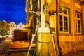 Jelenia Gora, Poland - June 28, 2022: Monument to the Jelenia GÃÂ³ra stilt walker on the wall of the Town Hall at night. Poland