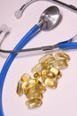 Jell Caps and Stethoscope Vertical Royalty Free Stock Photo