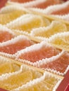 Jellied fruits in paper cases