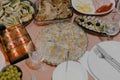 Jellied meat with different dishes on the table.