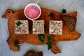 Jellied meat with horseradish on a wooden board.style hugge