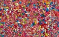 Jelly beans jellybean candy and sprinkles food background with various covers and flavors