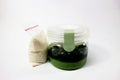 Jelly coco pandan in a plastic jar, with a sachet of coconut cream or coconut milk, for iftar food or breakfasting.