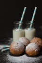 Jelly doughnuts and two bottles of milk Royalty Free Stock Photo