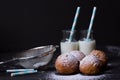 Jelly doughnuts and two bottles of milk Royalty Free Stock Photo